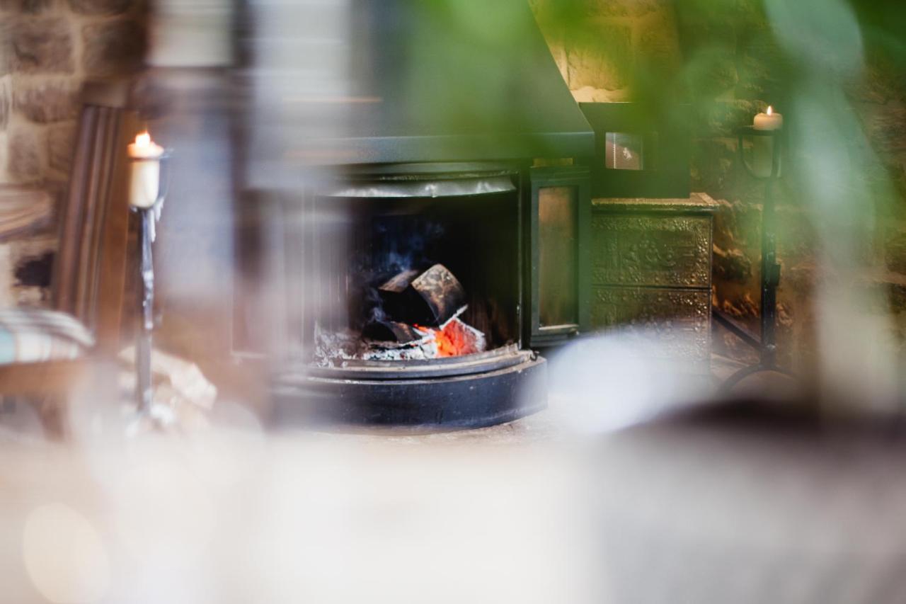 The George Inn Barford St Michael Bagian luar foto A fireplace in the restaurant